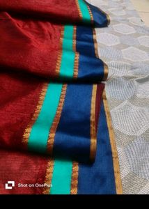 Maroon Saree With Sleevless Blouse