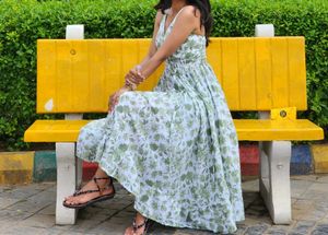 &#34;Backless. Bold. Beautiful. This floral dress is s