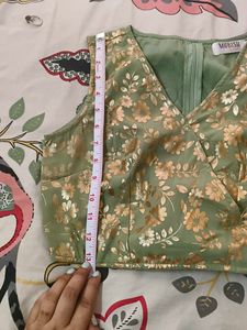 Green floral blouse