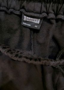 BONKERS corner BLACK WIDE-LEG SWEATPANTS
