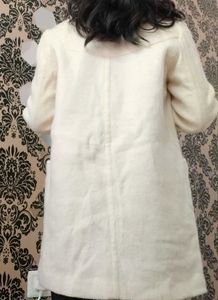 Cream Wool Overcoat: Classic and Versatile
