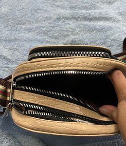 Caprese Medium Croc Textured Sling