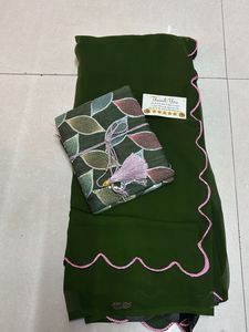 Elegant Green Saree with Pink Border