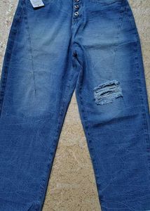 Ripped Blue Denim Jeans with tag