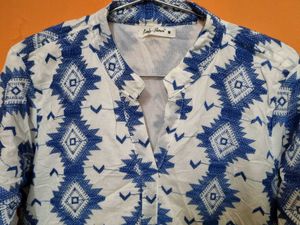 White Knee-Length One-Piece with Blue Embroidery