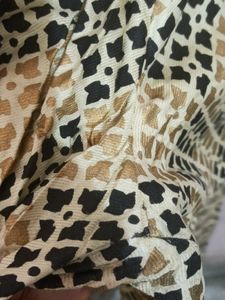 Rangmanch Beige Printed Flared Palazzo