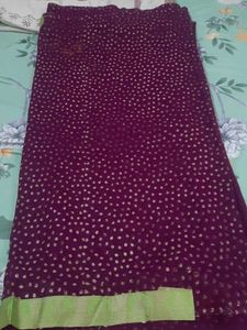 Purple saree with gold polka dots