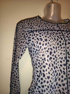 Size S Animal Print Sheer Top