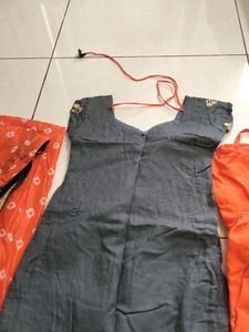 An Orange+Grey Suit