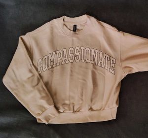 Compassionate Beige Sweatshirt