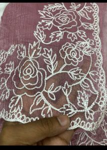 Elegant Mauve Embroidered Saree