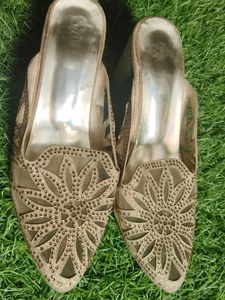Woman Golden Heels