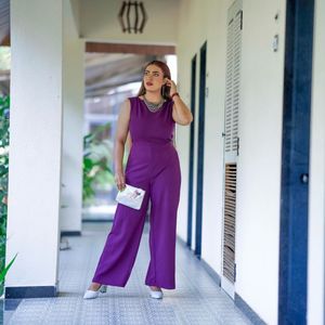 Maroon open back tassle jumpsuit