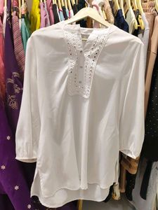 beautiful white mirror work top