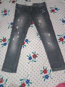 Distressed Gray Denim Jeans