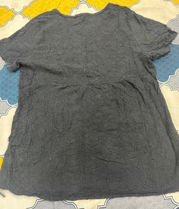 black embroidered top