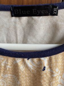 Cream Printed Regular Fit Top With Cold Shoulders