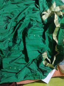 It&#39;s a Green Pleated Gown (Stiched) With Heavy (Bi