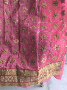 Pink Embroidered unstitched suit piece.