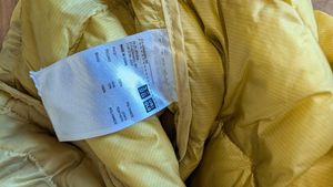 Uniqlo ultra light down jacket in butter yellow