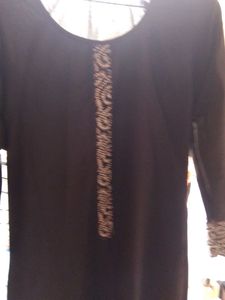 Black Skirt with Embroidered Hem