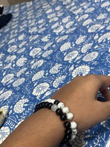 pair of two batcelets black and white