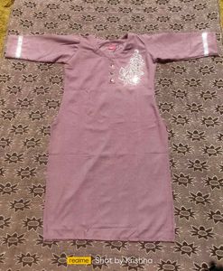 A Beautify Kurti With Beeds Work Design