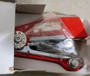 Mini Handy Sewing Machine.