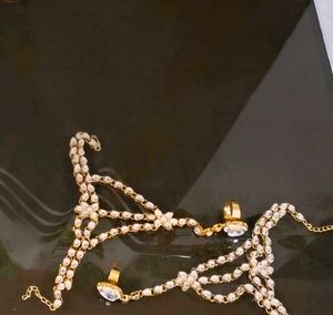 WHITE KUNDAN HATHPHOOL BRACELET