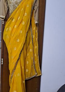 Yellow Border Saree With Golden Blouse
