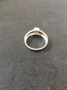 Pure silver ring with green zircon stone.
