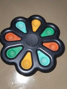 Simple Dimple Spinner Toy