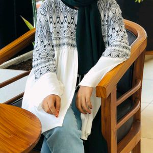 Open Type White Top. Can Pair It With Black Inner