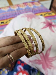 4 golden bangles
