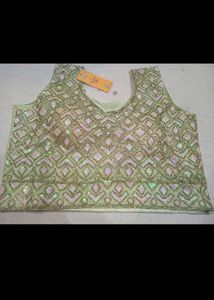 Embroidered Green net lehenga