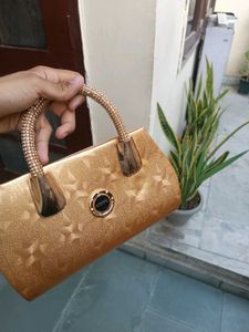 Elegant Gold Handbag
