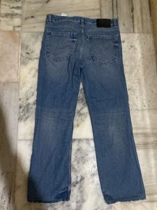 Distressed Wide-Leg Jeans