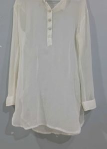 Sheer white long-sleeve tunic top