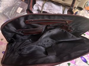 Elegant Burgundy Handbag with laptop sleeve