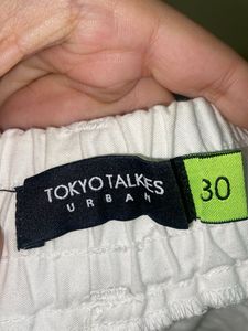 White Cargo Pants with Graphic Details