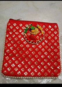 Red,rani pink, and purple Embroidered Clutches