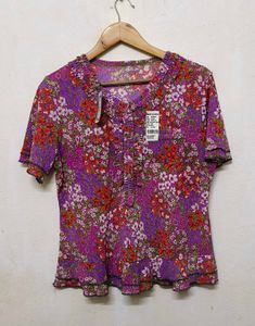 Trendy New Floral Ruffle Neck Top