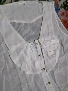 White Sleeveless Blouse