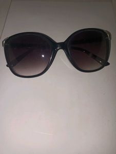 Sunglasses:“Shades of Confidence”