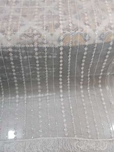 Elegant Embroidered Net Fabric with Fringe