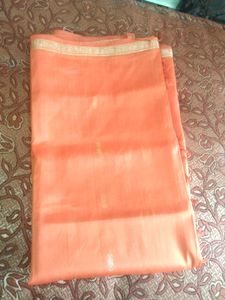 orange colour pure silk saree