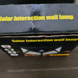 Solar Interaction Wall Light
