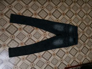 Distressed High-Waisted Black Jeans