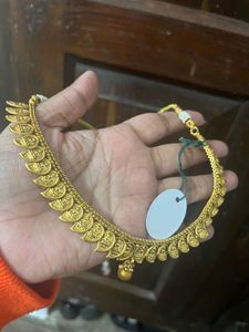 Gold-toned Godess carving Necklace