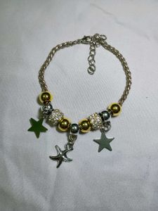 golden &amp; silver drop star wristlet chain bracelet